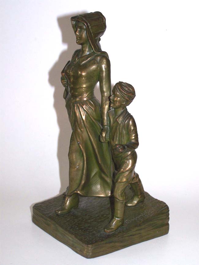 A fine and rare pair of Antique Bookends circa 1930 depicting a Pioneer Woman and Her Son — image 2